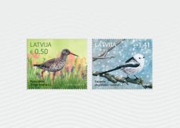 Two new stamps in the Latvian Birds series feature the Bird of the Year 2018 common redshank and the long-tailed tit 