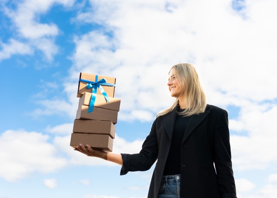 02.09-22 Woman holding a box